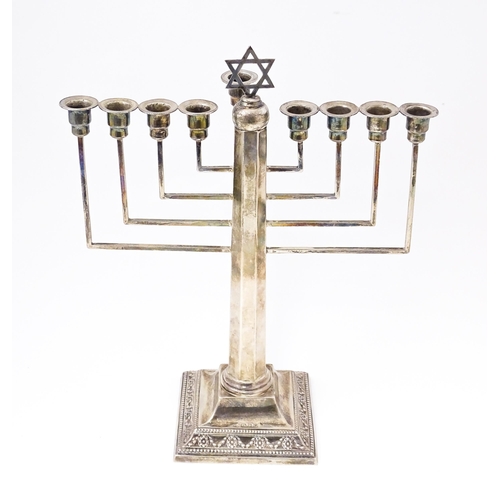 580 - Judaica : A silver Hanukkah Menorah with 9 branches and surmounted by Star of David. Hallmarked Lond... 