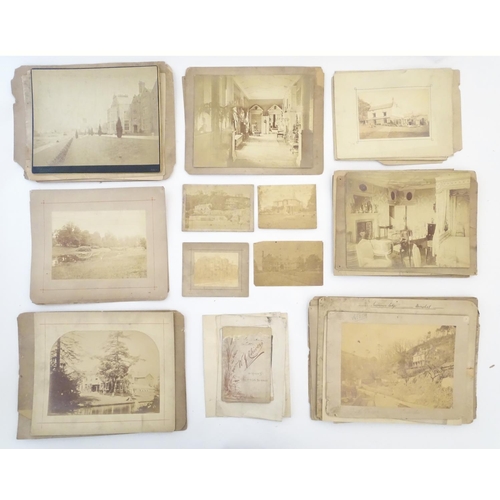 2223 - A quantity of Victorian sepia photographs depicting houses, interior scenes and landscapes, possibly... 