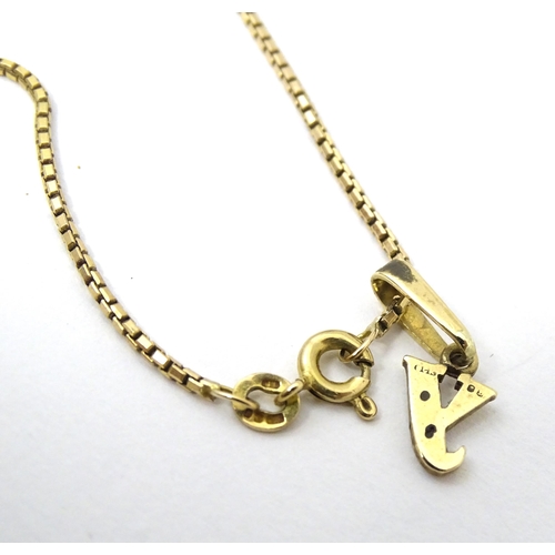 697 - A 9ct gold chain, together with another of white and yellow gold. Both approx 18