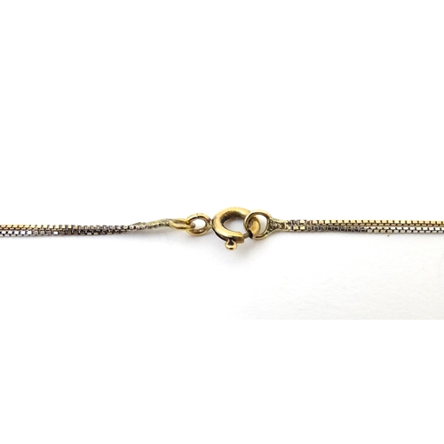 697 - A 9ct gold chain, together with another of white and yellow gold. Both approx 18