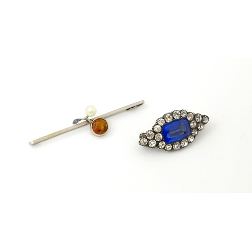 705 - A 9ct white gold broch set with citrine and peal. Together with a white metal brooch set with centra... 