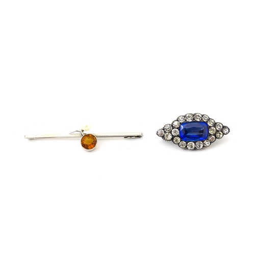 705 - A 9ct white gold broch set with citrine and peal. Together with a white metal brooch set with centra... 