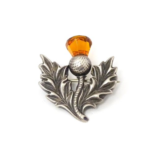 708 - A Scottish silver brooch of thistle form, hallmarked Edinburgh 1961 maker Robert Allison & Son. Appr... 