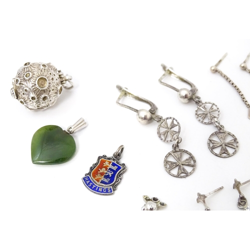 717 - Assorted silver plate, silver and white metal charms etc to include   a charm formed as a planet ope... 