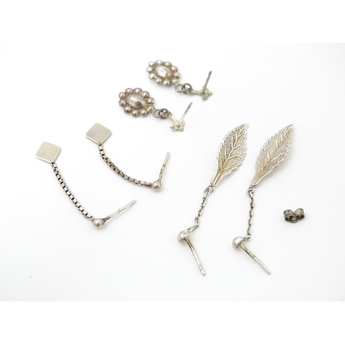 717 - Assorted silver plate, silver and white metal charms etc to include   a charm formed as a planet ope... 