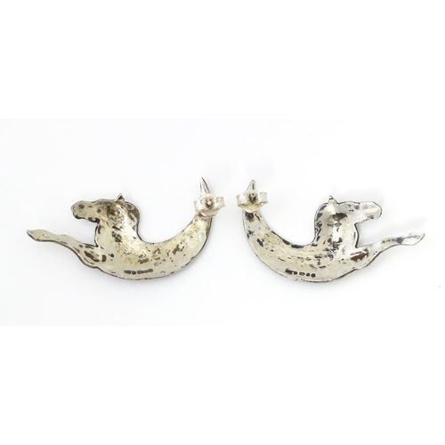 718 - A pair of silver earrings formed as stylized zebras. Hallmarked London 1989 maker MED. approx 1 3/4