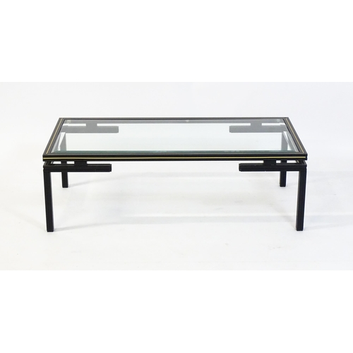 1789 - A late 20thC Pierre Vandel designed glass top coffee table. 42