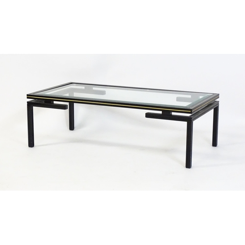 1789 - A late 20thC Pierre Vandel designed glass top coffee table. 42