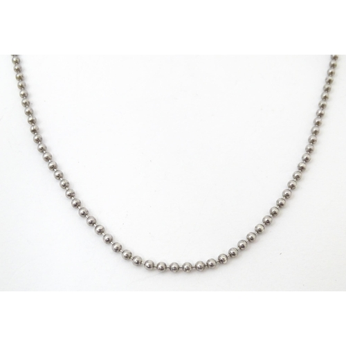 726 - Two silver chain necklaces.  The longest 24