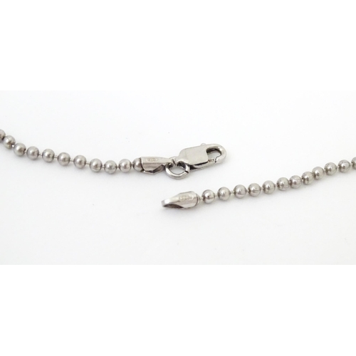 726 - Two silver chain necklaces.  The longest 24