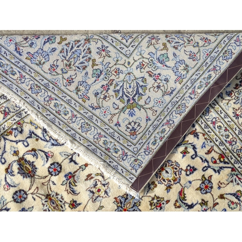 1494 - Carpet / Rug : A Central Persian Kashan carpet, the cream ground with central medallion with floral ... 