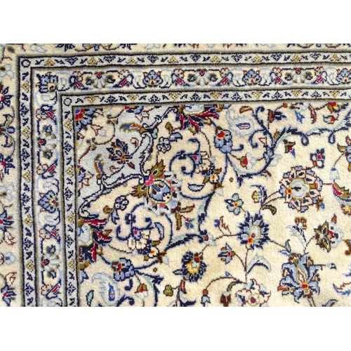 1494 - Carpet / Rug : A Central Persian Kashan carpet, the cream ground with central medallion with floral ... 