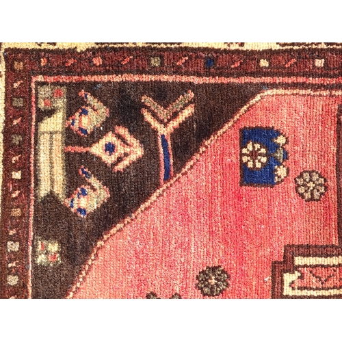 1495 - Carpet / Rug :  A North West Persian Heriz runner, the cream,  red and black grounds with geometric ... 