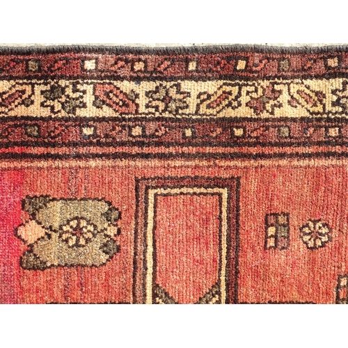 1495 - Carpet / Rug :  A North West Persian Heriz runner, the cream,  red and black grounds with geometric ... 