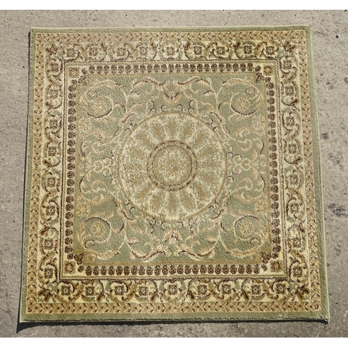 1497 - Carpet / Rug : A square rug with beige and sage green grounds decorated with central medallion  bord... 