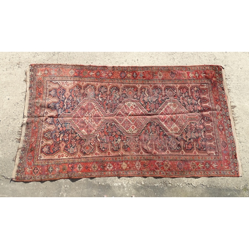 1504 - Carpet / Rug : A rug with red, cream, and dark blue ground decorated with central medallions having ... 