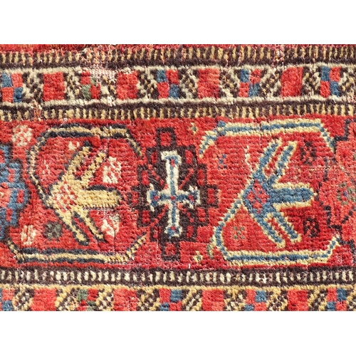 1504 - Carpet / Rug : A rug with red, cream, and dark blue ground decorated with central medallions having ... 