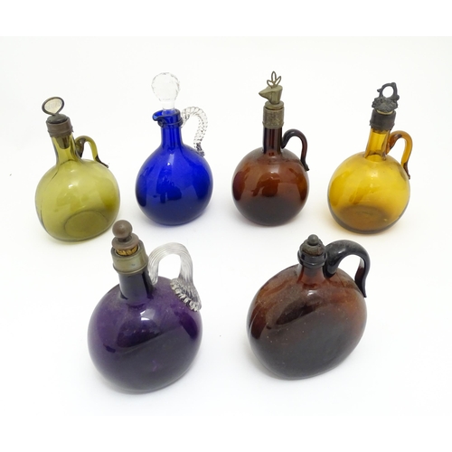 306 - Six assorted 19thC and later glass flagons / flasks with loop handles to include a Victorian Bristol... 