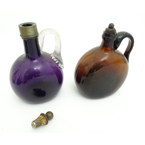 306 - Six assorted 19thC and later glass flagons / flasks with loop handles to include a Victorian Bristol... 