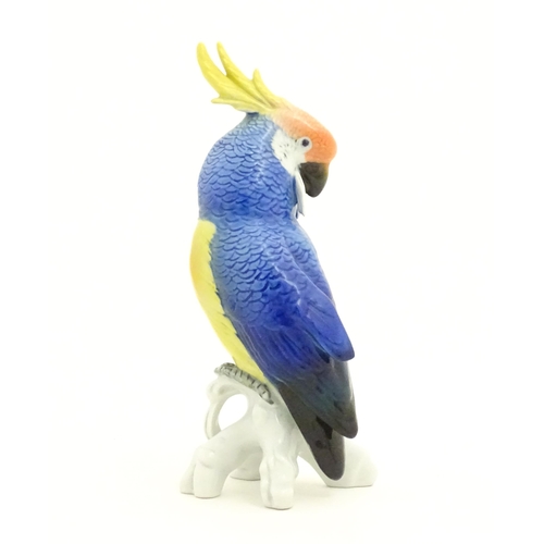 169 - A Karl Ens model of a Parrot / Cockatoo perched on a branch. Marked under. Approx. 7 3/4