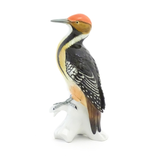 172 - A Karl Ens model of a Woodpecker perched on a branch. Marked under. Approx. 10