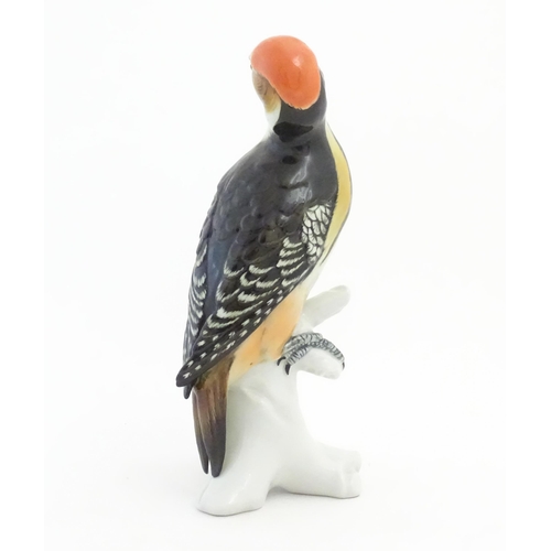 172 - A Karl Ens model of a Woodpecker perched on a branch. Marked under. Approx. 10