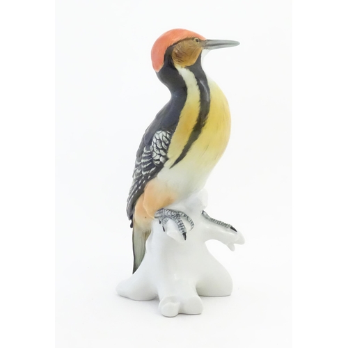 172 - A Karl Ens model of a Woodpecker perched on a branch. Marked under. Approx. 10