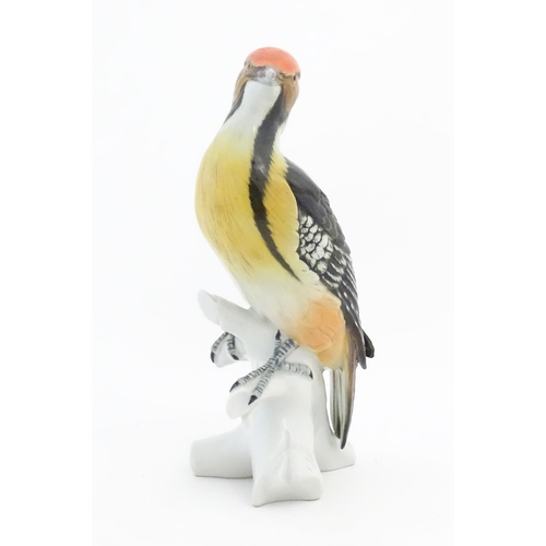 172 - A Karl Ens model of a Woodpecker perched on a branch. Marked under. Approx. 10