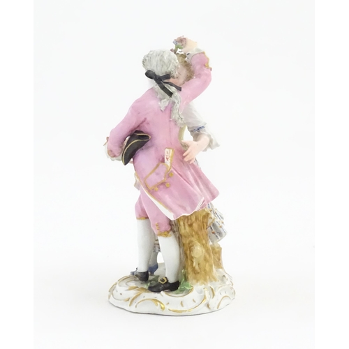 176 - A Meissen figure group modelled as a dancing couple. Marked under. Approx. 6