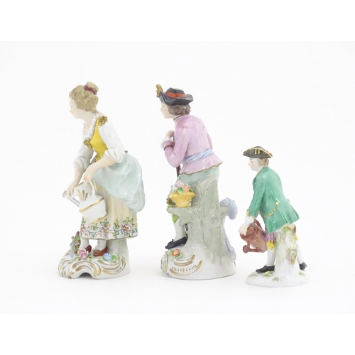 179 - Three porcelain figures to include a Derby style figure modelled as a gardener wearing a black hat, ... 