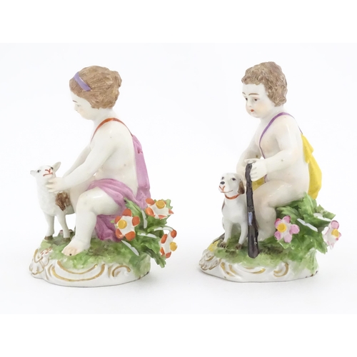 180 - A pair Continental figures one modelled as a putto with sheep, the other with a dog. Approx. 3 1/2