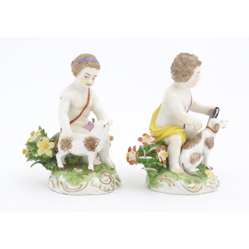 180 - A pair Continental figures one modelled as a putto with sheep, the other with a dog. Approx. 3 1/2