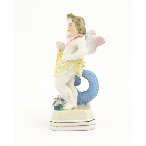 183 - A Continental figure modelled as a putti resting on a Georgian dolphin. Marked under with initials f... 