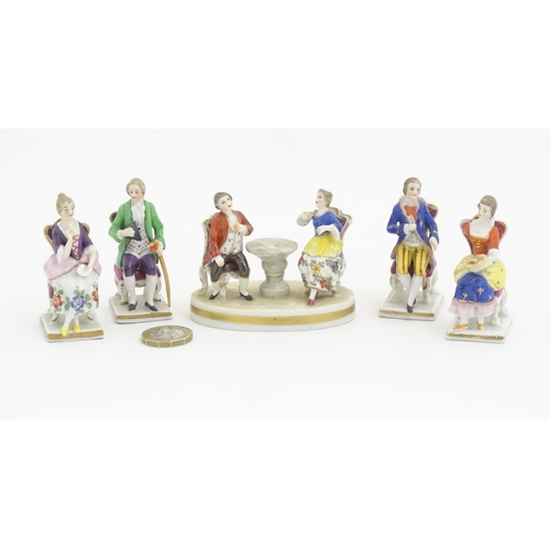 184 - A quantity of assorted Continental porcelain miniatures formed as Regency figures. Some marked under... 