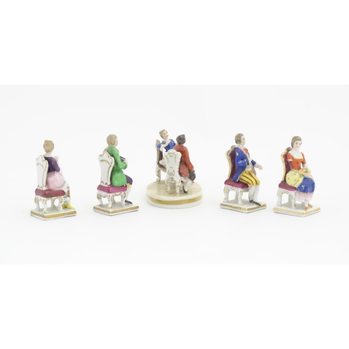 184 - A quantity of assorted Continental porcelain miniatures formed as Regency figures. Some marked under... 