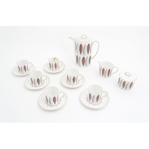 188 - A vintage / retro Susie Cooper coffee set in the Hyde Park pattern, comprising coffee pot, milk jug,... 