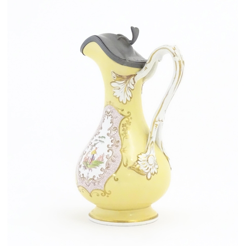 193 - A Victorian ewer with hinged pewter lid, the body decorated with chinoiserie detail. Retailers mark ... 