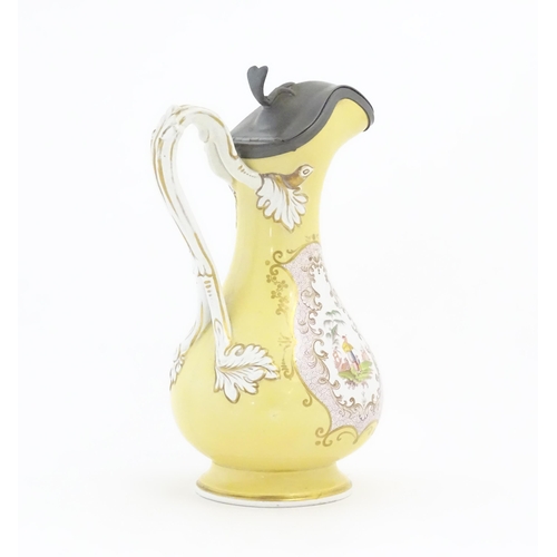 193 - A Victorian ewer with hinged pewter lid, the body decorated with chinoiserie detail. Retailers mark ... 