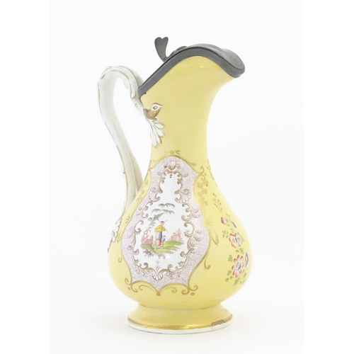 193 - A Victorian ewer with hinged pewter lid, the body decorated with chinoiserie detail. Retailers mark ... 