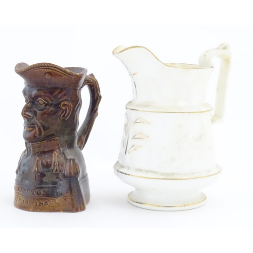 208 - A Victorian treacle glazed character jug modelled as the bust of the Duke of Wellington. Together wi... 