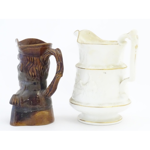 208 - A Victorian treacle glazed character jug modelled as the bust of the Duke of Wellington. Together wi... 