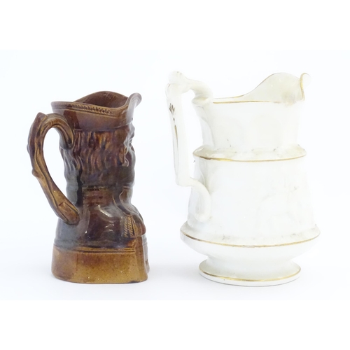 208 - A Victorian treacle glazed character jug modelled as the bust of the Duke of Wellington. Together wi... 