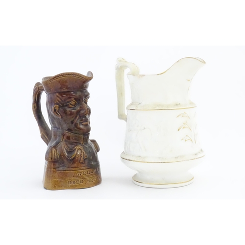 208 - A Victorian treacle glazed character jug modelled as the bust of the Duke of Wellington. Together wi... 