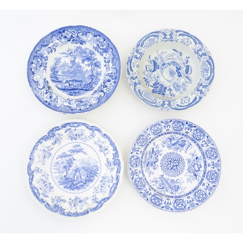 214 - A quantity of assorted blue and white plates, dishes, bowls, etc. Patterns to include Triumphal Car,... 