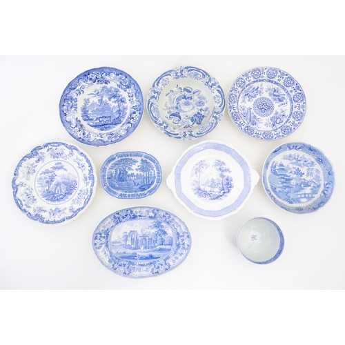 214 - A quantity of assorted blue and white plates, dishes, bowls, etc. Patterns to include Triumphal Car,... 