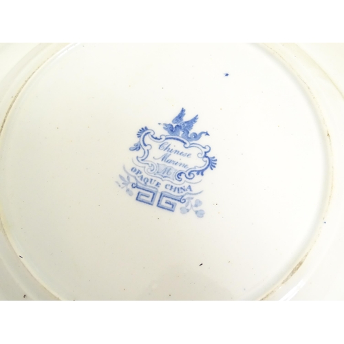 226 - Eight assorted blue and white plates / dishes to include a Minton plate in the pattern Chinese Marin... 