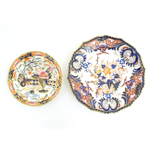 117 - A Derby porcelain plate decorated in the Imari Kings / Old Japan pattern. Together with a Derby styl... 