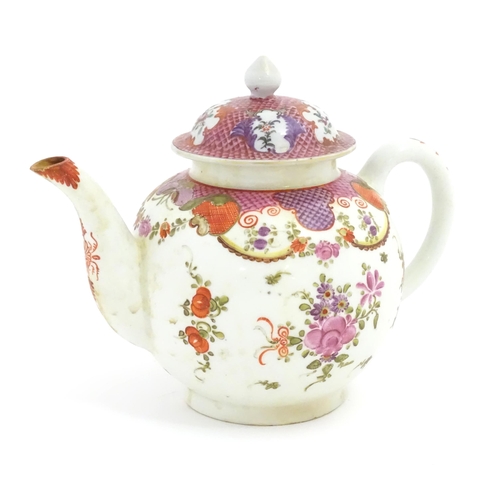 56 - A Lowestoft teapot decorated in the Curtis pattern decorated with flowers and foliage. Approx. 6 1/2... 