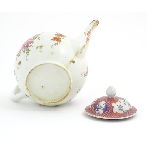 56 - A Lowestoft teapot decorated in the Curtis pattern decorated with flowers and foliage. Approx. 6 1/2... 