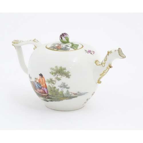 66 - A Meissen teapot decorated with pastoral scenes with figures in a rural landscape. The spout modelle... 